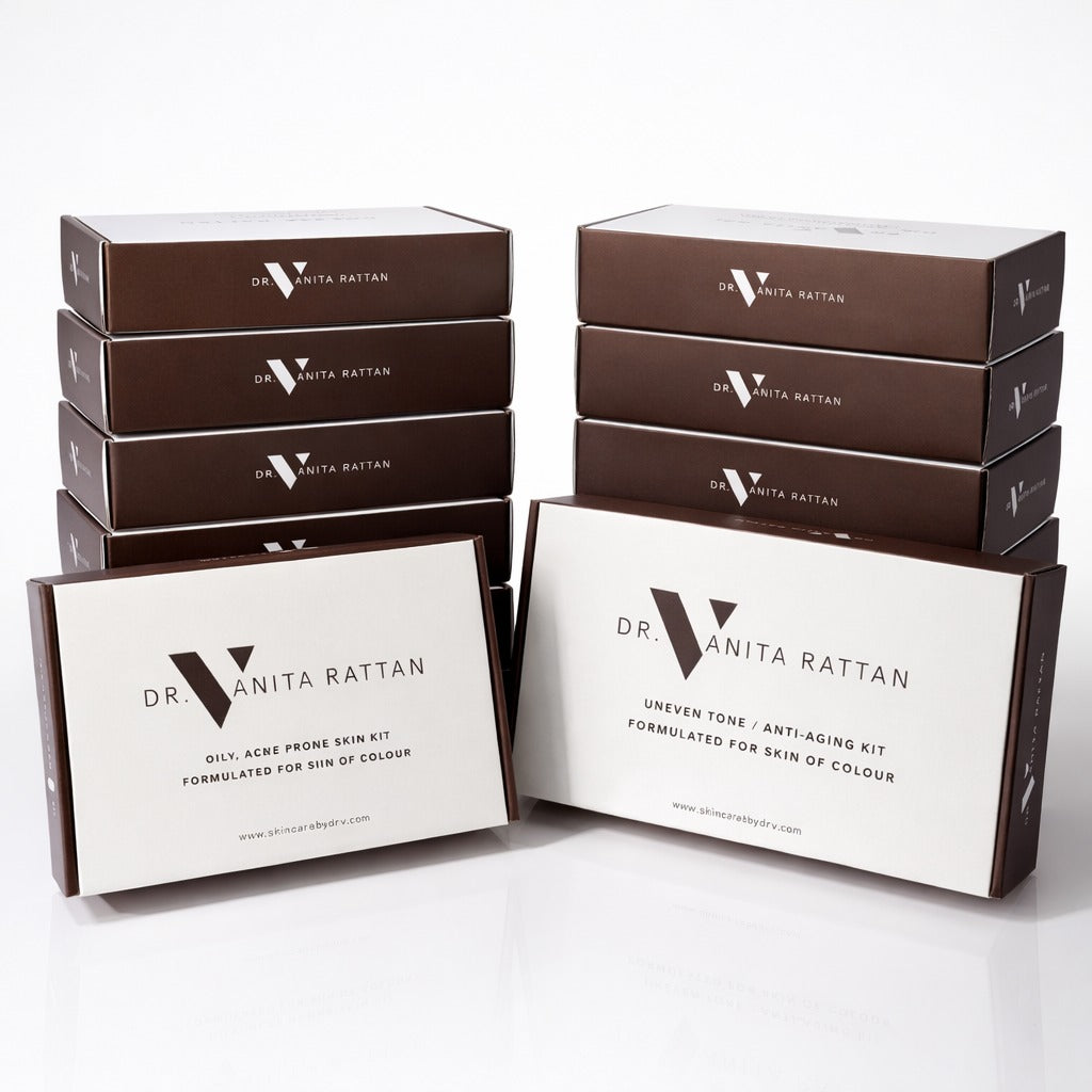 Dr. Vanita Rattan skincare kit boxes on a white background
